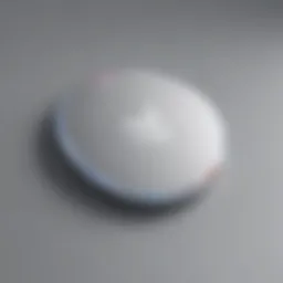 Close-up of an Apple AirTag showcasing its sleek design