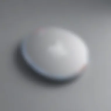 Close-up of an Apple AirTag showcasing its sleek design