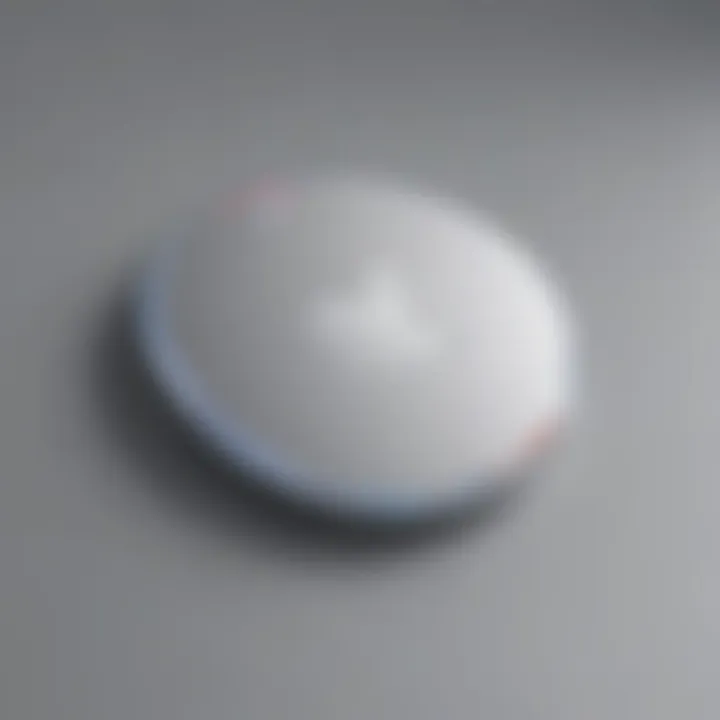 Close-up of an Apple AirTag showcasing its sleek design